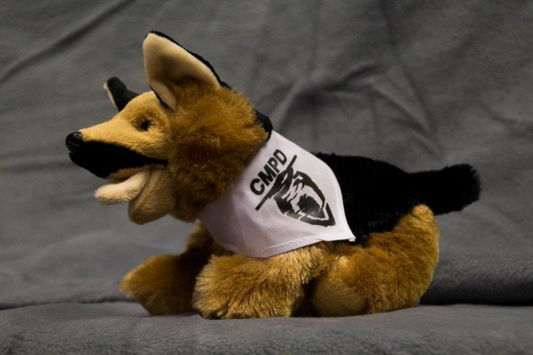 Stuffed German Shepherd with CMPD logo bandana.
